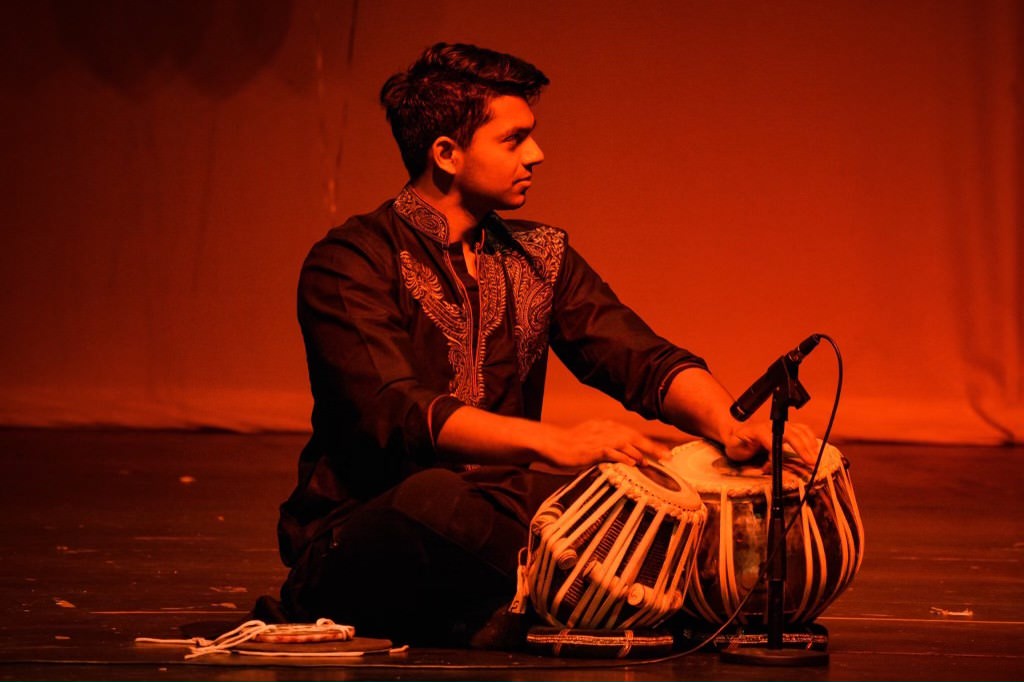 Image of Sid playing at a classical performance